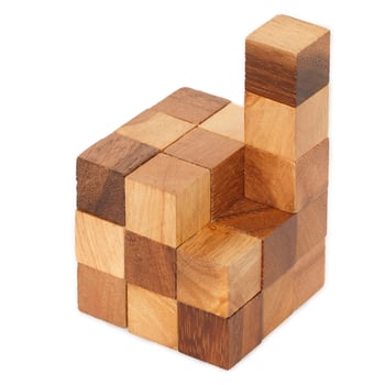 one puzzle wooden cube isolated on white photo