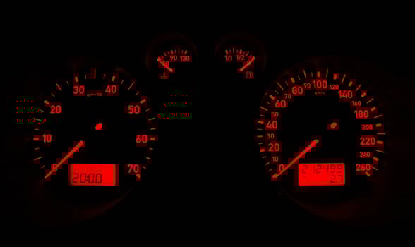 Car dashboard glowing a red light photo