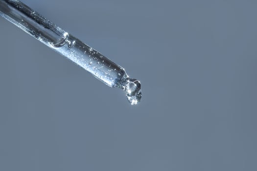 Droplet on a laboratory pipette photo