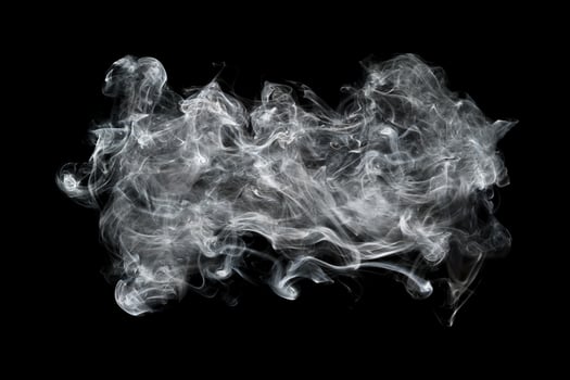 white smoke isolated on black for background and design photo