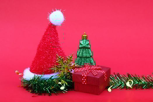 santa claus hat with christmas tree and gift for new year and christmas design photo