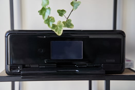 Black inkjet printer is on the shelf photo