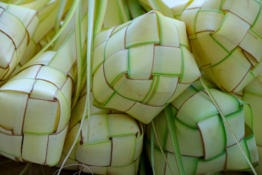 Woven Palm Leaves Pendants Close-up Detailed Texture photo