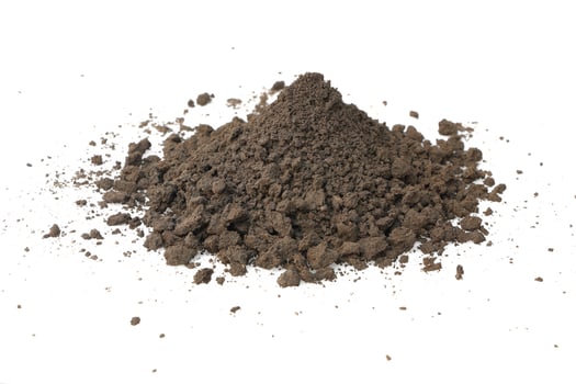 dry dark soil isolated on white. photo