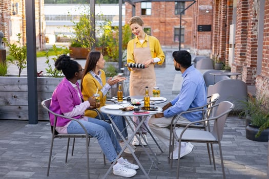 Friends enjoying food at a restaurant photo