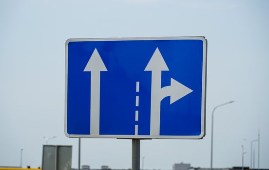 A blue and white sign photo