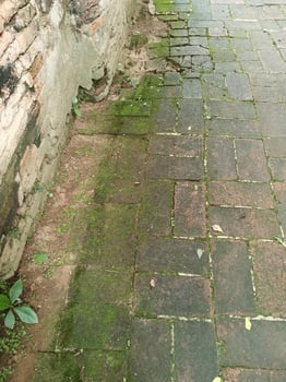 ancient walkway by brick in temple background photo