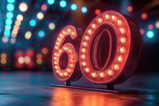 Glowing number 60 sign marking a 60th anniversary or birthday celebration photo