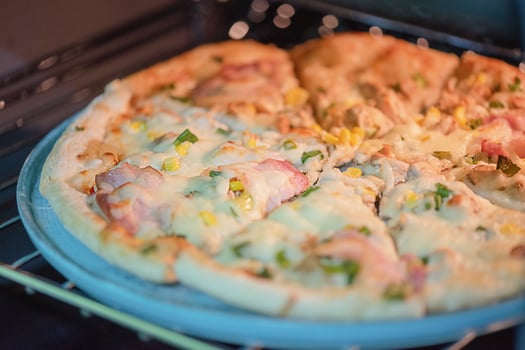 Pizza in a ceramic plate for serving. photo