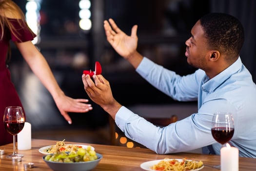 Proposal Rejection. Woman Leaving Black Boyfriend In Restaurant After He Proposed Marriage, Desperate African American Man Begging For Yes Answer, Sitting At Table With Diamond Ring Box In Hand photo