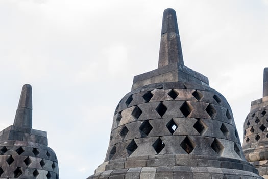 Stone Carved Ancient Stupa Detail at Borobudur Temple Indonesia Landmark photo