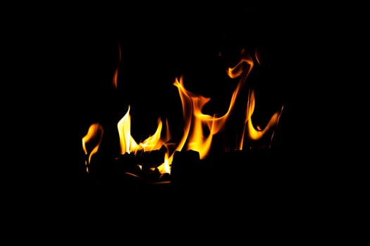Fire flame texture. Burning material backdrop. Burn effect pattern. Blaze and torch wallpaper. Heat and haze photo