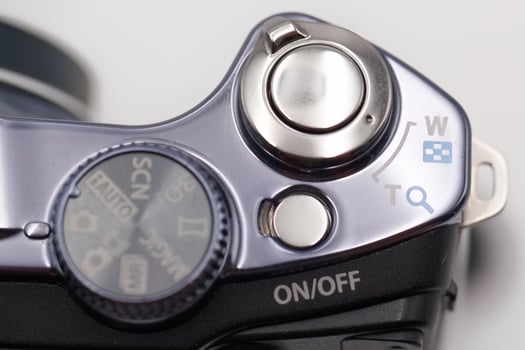 Close up view of a camera control panel with buttons and settings in a studio setting during daylight hours photo