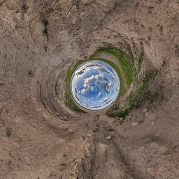 A 360 view of the sky from inside a hole photo
