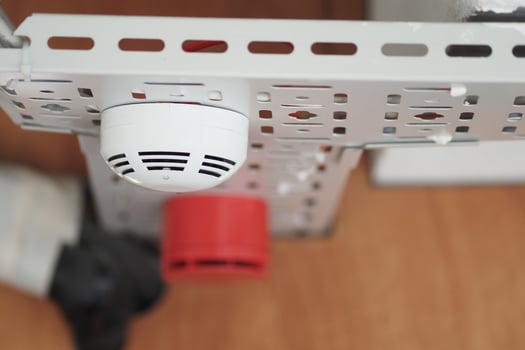 Smoke detector installation in a modern interior space photo