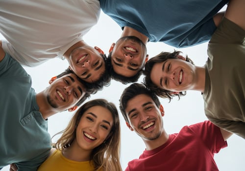 Group of friends standing in a circle photo