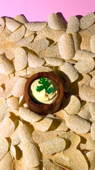 Closeup of Potato Chips and Creamy Dip photo