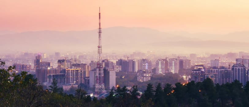 Aerial view Tajikistan republic capital Dushanbe panorama from popular hilltop Victory park viewpoint with Tv tower, landmarks, buildings, real estate property development site photo