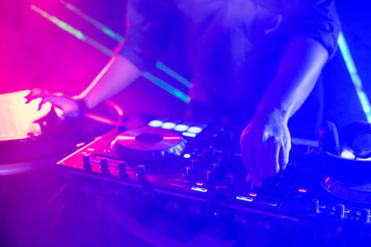 Dj mixing music at a party photo
