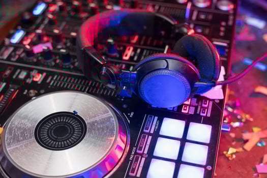 Dj equipment and headphones on a table photo