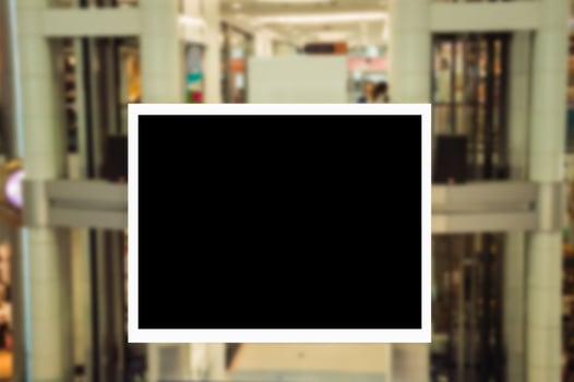 A black square frame in a mall photo