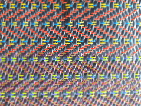 A close up of a fabric with colorful squares photo