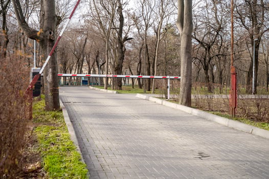 Automatic barrier, security system at the entrance to the city green park area. photo