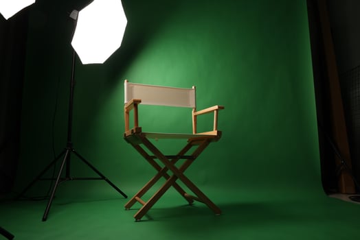 Chair, of Film Director. Directors chair in green screen studio setup with softbox lighting. photo