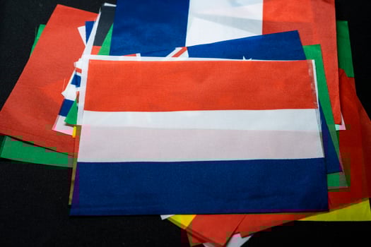 Netherlands Flag with Background of Other National Flags photo