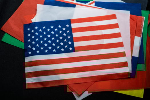 USA Flag with Background of Other National Flags photo