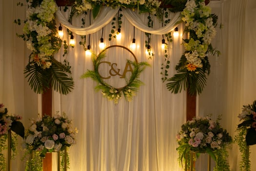 wedding ceremony with flowers and lights photo