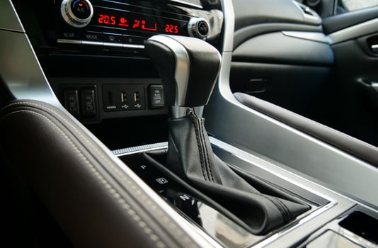 Automatic transmission shift lever inside premium car in parking position photo