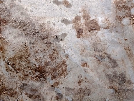 Concrete surface with stains and textures, ideal for construction or industrial themes. photo