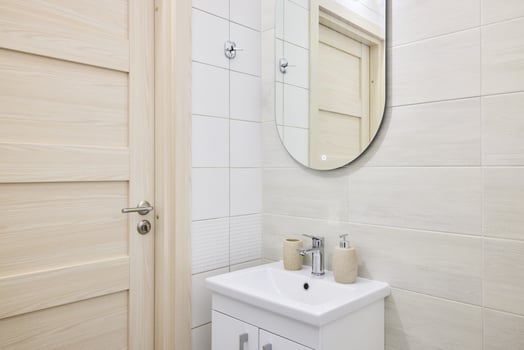 A Modern Bathroom featuring a Minimalist Design complemented by Elegant and Stylish Fixtures photo