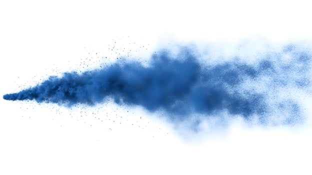 Blue powder explosion isolated on white background photo