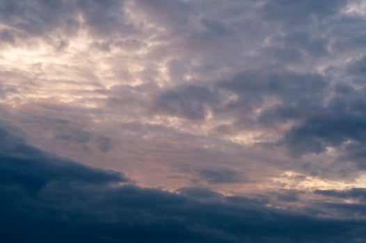 Dramatic orange sunset with cloudy sky photo