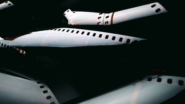 The film creates a vintage and nostalgic feel. Close-up of a roll of film showing the perforated edges. photo