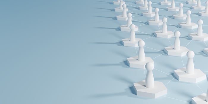3D render of a scattered network of white hexagonal with abstract person icons, symbolizing social connections, human resources, teamwork, community, and networking opportunities. photo