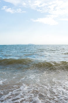 Atmosphere of the waves with a gentle breeze at Bangsaen, Chonburi, Thailand photo