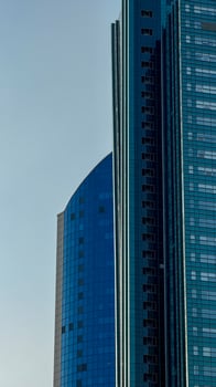 Majestic cobalt skyscrapers kiss the sky, evoking urban monoliths during Seouls Changdeokgung Lunar New Year skyline festival photo