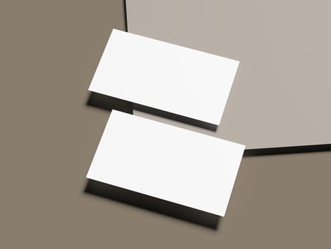 Elegant white cards on brown-beige modern paper background mockup photo