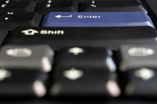 A close up of a keyboard with a shift key photo