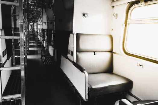 A black and white photo of a train car