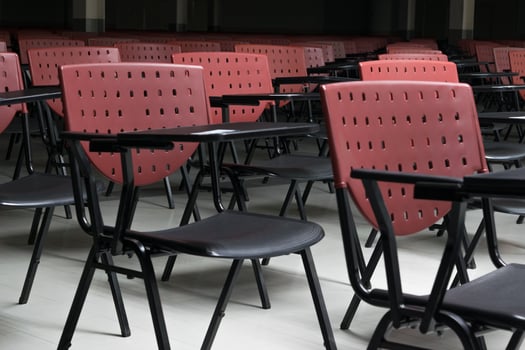 A row of chairs in a classroom photo