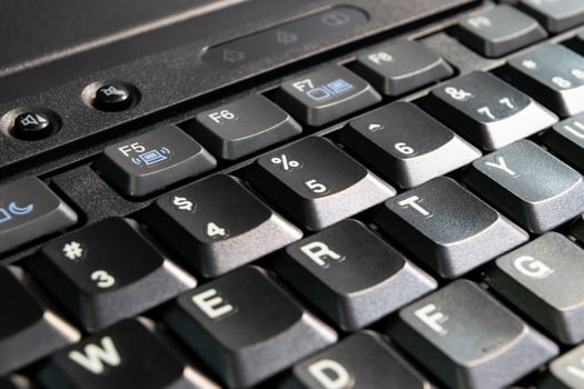 A close up of a keyboard on a laptop computer photo