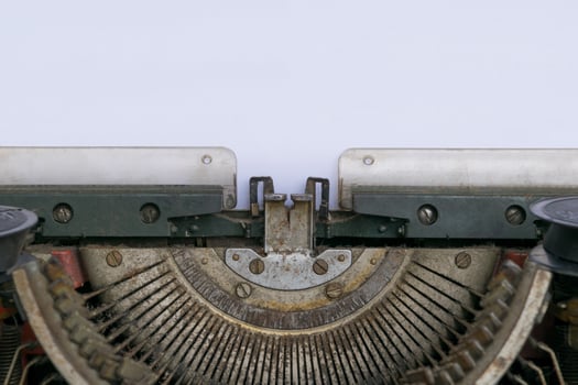 An old typewriter with a white background photo