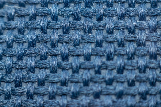 A close up of a blue woven fabric photo