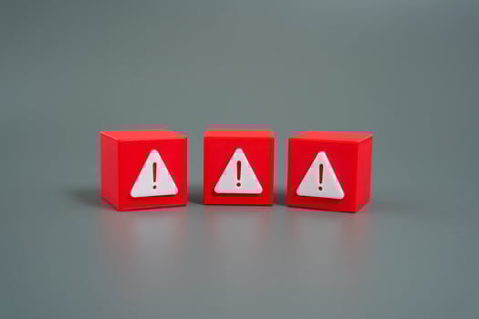 Warning signs for errors or dangers. Cautionary awareness, compliance issues, or early warnings in finance, industry, or daily life. Risk mitigation, system failures, or human error. photo