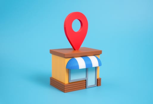 Shop with geolocation symbol on roof. Location pin button. Business location marketing, visibility on map platforms, and online-to-offline customer conversion. Modern retail discovery photo