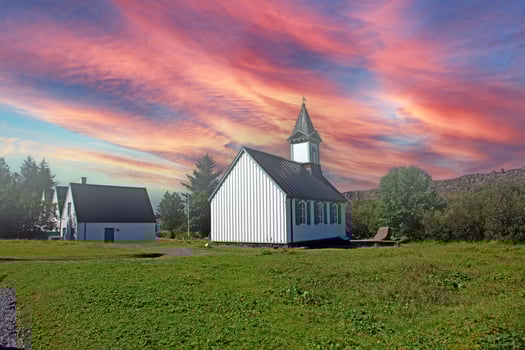 Church and colorful sunset Thingvellir National Park photo